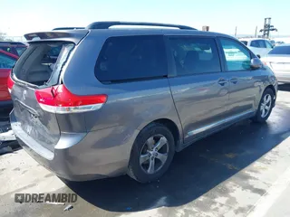 2012 Toyota Sienna LE AAS with VIN 5TDKK3DC9CS184722, listed as a IAAI auction lot 41942991 with 227,783 mi miles. Bid and sale history available at carsss.com. Image 4.