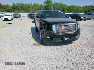 2015 GMC Yukon Denali z VIN 1GKS2CKJ8FR132636, wystawiony jako Copart lot #53567045 z przebiegiem 148 997 mil mil oraz Szkoda całkowita • Salvage title. Historia ofert i sprzedaży dostępna na DreamBid. Obrazek 12.