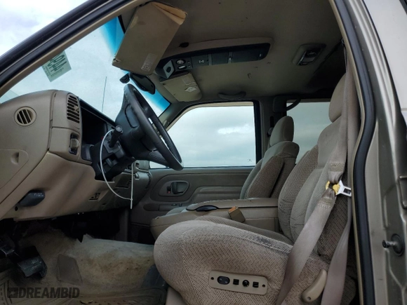1999 Chevrolet Tahoe with VIN 1GNEC13R9XJ557532, listed as a Copart auction lot 44948845 with 215,360 mi miles and Salvage Title. Bid and sale history available at carsss.com. Image 7.