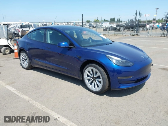 2023 Tesla Model 3 z VIN 5YJ3E1EA6PF547209, wystawiony jako IAAI lot #42511077 z przebiegiem 6 125 mil mil oraz . Historia ofert i sprzedaży dostępna na DreamBid. Obrazek 1.