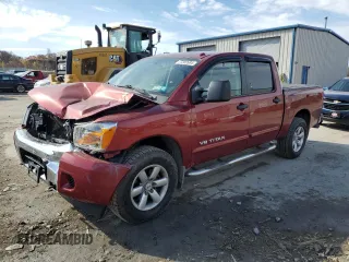 2015 Nissan Titan SL with VIN 1N6AA0EC9FN505189, listed as a Copart auction lot 77302684 with 92,224 mi miles and Salvage Title. Bid and sale history available at carsss.com. Image 1.