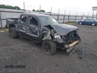 2022 Toyota Tacoma SR with VIN 3TYCZ5AN4NT070376, listed as a IAAI auction lot 42120374 with 73,560 mi miles and . Bid and sale history available at DreamBid. Image 1.