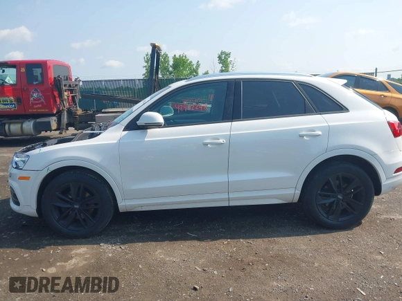 2017 Audi Q3 Premium z VIN WA1ECCFS7HR009402, wystawiony jako IAAI lot #42462248 z przebiegiem 46 536 mil mil oraz . Historia ofert i sprzedaży dostępna na DreamBid. Obrazek 14.