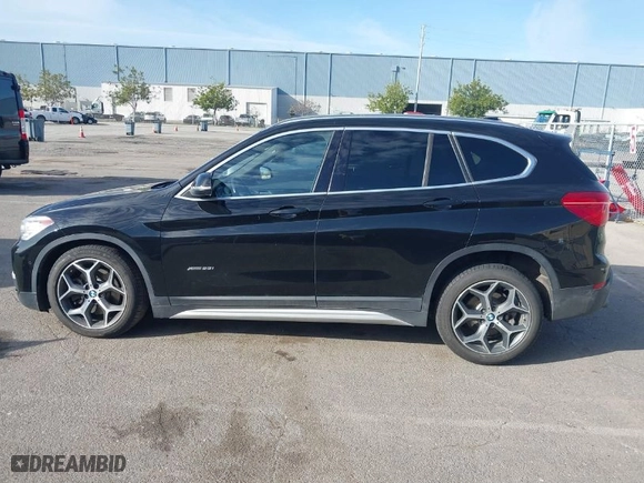 2016 BMW X1 xDrive28i with VIN WBXHT3C32G5F64687, listed as a IAAI auction lot 41852278 with 64,620 mi miles. Bid and sale history available at carsss.com. Image 15.