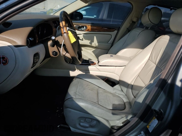 2006 Jaguar XJ Vanden Plas with VIN SAJWA82BX6SH09069, listed as a Copart auction lot 68122604 with 153,999 mi miles and Salvage Title. Bid and sale history available at carsss.com. Image 7.