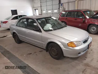 2000 Mazda Protege DX with VIN JM1BJ2226Y0206340, listed as a IAAI auction lot 41645396 with 238,500 mi miles and . Bid and sale history available at DreamBid. Image 1.