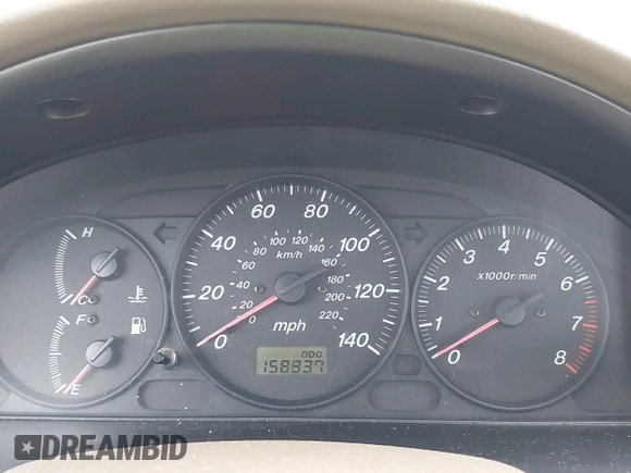 2000 Mazda Protege DX with VIN JM1BJ2220Y0273953, listed as a IAAI auction lot 41956058 with 158,837 mi miles and . Bid and sale history available at DreamBid. Image 7.