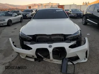2024 BMW M4 Competition xDrive with VIN WBS43AZ06RCP25821, listed as a Copart auction lot 84095354 with 32,411 mi miles and Salvage Title. Bid and sale history available at carsss.com. Image 5.