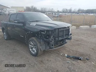 2022 Ram 1500 Laramie with VIN 1C6SRFJT6NN402536, listed as a IAAI auction lot 42109220 with 29,618 mi miles and . Bid and sale history available at DreamBid. Image 1.