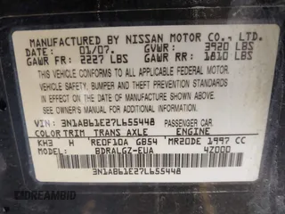 2007 Nissan Sentra 2.0 z VIN 3N1AB61E27L655448, wystawiony jako IAAI lot #41587772 z przebiegiem 184 202 mil mil oraz . Historia ofert i sprzedaży dostępna na DreamBid. Obrazek 9.