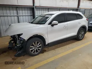 2017 Mazda CX-9 Touring с VIN JM3TCACY8H0138948, выставлен на аукционе Copart как лот 86755594 с пробегом 89 828 миль миль и Списание • Salvage title. История ставок и продаж доступна на DreamBid. Изображение 1.