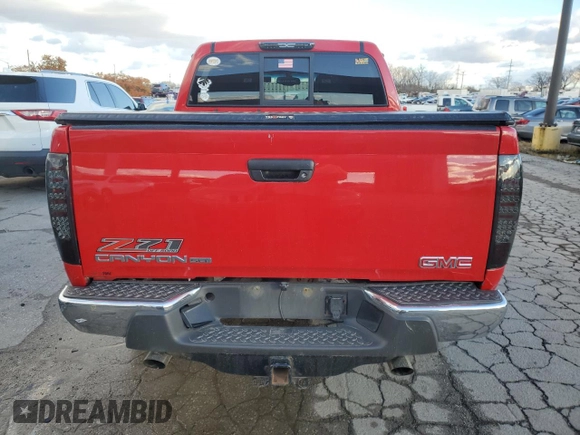 2011 GMC Canyon SLT with VIN 1GTH6NFP1B8113219, listed as a Copart auction lot 80649194 with 120,979 mi miles and Salvage Title. Bid and sale history available at carsss.com. Image 6.