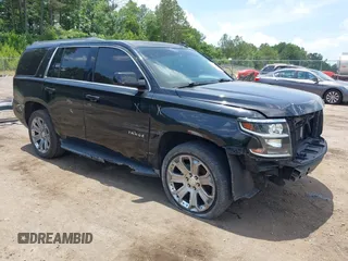 2016 Chevrolet Tahoe LT with VIN 1GNSCBKC5GR137919, listed as a IAAI auction lot 42334905 with 178,837 mi miles and . Bid and sale history available at DreamBid. Image 1.