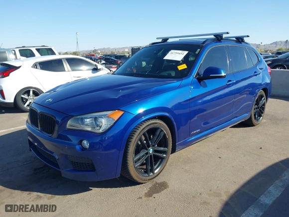 2015 BMW X1 xDrive28i with VIN WBAVL1C56FVY32753, listed as a IAAI auction lot 41759454 with 130,823 mi miles. Bid and sale history available at carsss.com. Image 18.