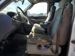 2003 Ford F-150 XL with VIN 2FTRX17213CA05950, listed as a Copart auction lot 54435115 with 310,503 mi miles and Salvage title. Bid and sale history available at DreamBid. Image 7.