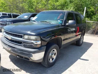 2005 Chevrolet Tahoe LS with VIN 1GNEC13VX5R180270, listed as a IAAI auction lot 42004969 with 164,258 mi miles. Bid and sale history available at carsss.com. Image 2.