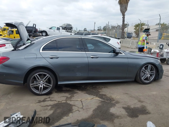 2018 Mercedes-Benz E 300 with VIN WDDZF4JBXJA477047, listed as a IAAI auction lot 42075763 with 62,843 mi miles and . Bid and sale history available at DreamBid. Image 13.