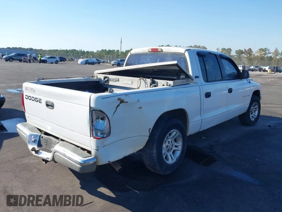 2001 Dodge Dakota Sport with VIN 1B7GL2AN81S127838, listed as a IAAI auction lot 40687174 with 235,301 mi miles. Bid and sale history available at carsss.com. Image 4.