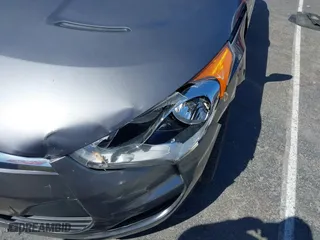 2015 Hyundai Veloster with VIN KMHTC6AD1FU233648, listed as a IAAI auction lot 41822881 with 162,368 mi miles. Bid and sale history available at carsss.com. Image 6.
