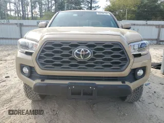 2020 Toyota Tacoma SR5 with VIN 3TMCZ5AN5LM338926, listed as a Copart auction lot 55236145 with 67,409 mi miles and Salvage title. Bid and sale history available at DreamBid. Image 5.