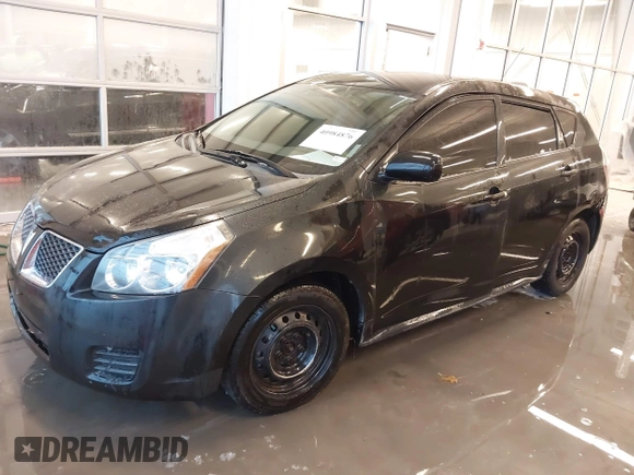 2010 Pontiac Vibe w/1SB with VIN 5Y2SP6E02AZ410781, listed as a IAAI auction lot 40984876 with 235,317 mi miles. Bid and sale history available at carsss.com. Image 2.