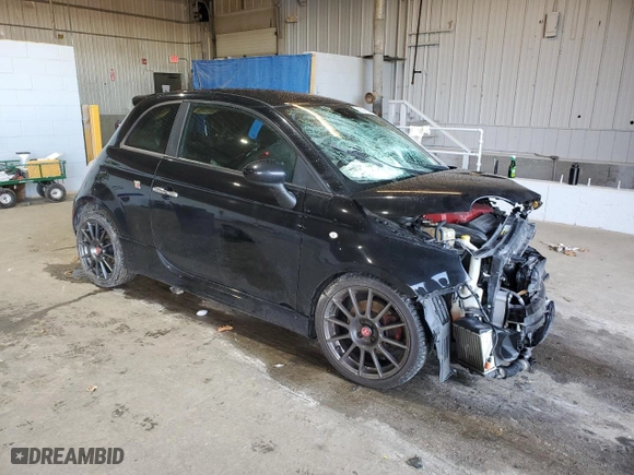 2015 FIAT 500 Abarth with VIN 3C3CFFFHXFT513994, listed as a Copart auction lot 82547154 with 67,923 mi miles and Salvage Title. Bid and sale history available at carsss.com. Image 4.