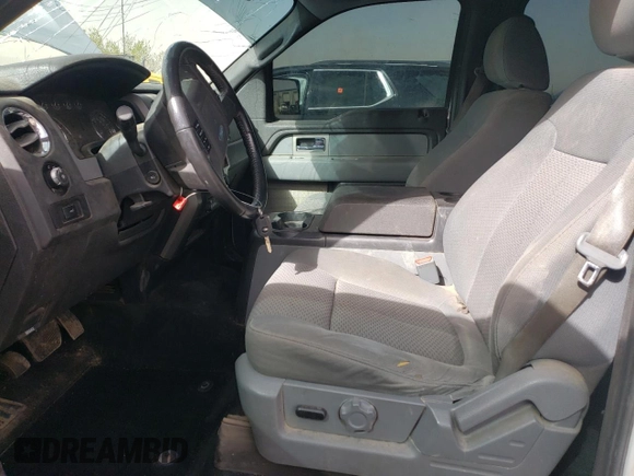 2011 Ford F-150 XLT with VIN 1FTFW1ET0BFC92699, listed as a Copart auction lot 48822555 with 202,806 mi miles and Salvage Title. Bid and sale history available at carsss.com. Image 7.