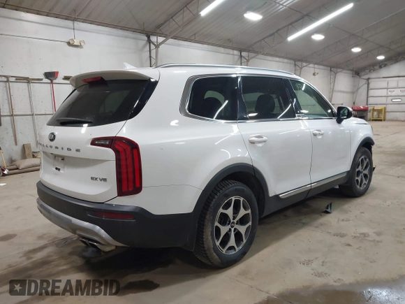 2020 Kia Telluride EX z VIN 5XYP3DHC5LG020089, wystawiony jako IAAI lot #41890001 z przebiegiem 87 396 mil mil oraz . Historia ofert i sprzedaży dostępna na DreamBid. Obrazek 4.