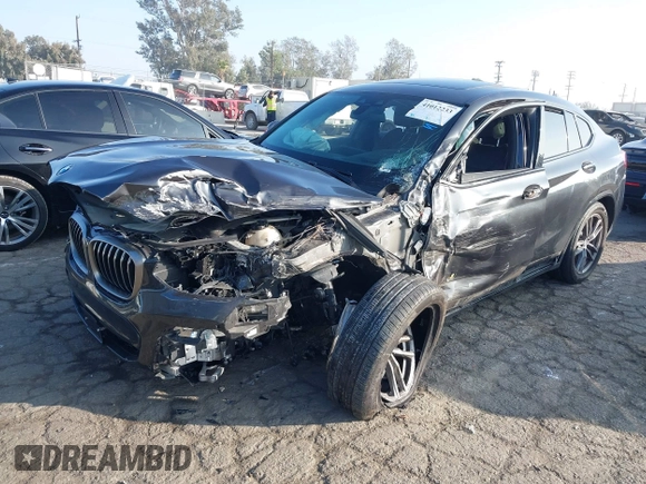 2019 BMW X4 M40i z VIN 5UXUJ5C54KLJ64077, wystawiony jako IAAI lot #41012233 z przebiegiem 40 737 mil mil oraz . Historia ofert i sprzedaży dostępna na DreamBid. Obrazek 16.
