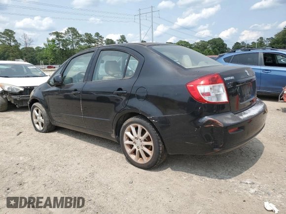 2011 Suzuki SX4 LE z VIN JS2YC5A24B6301058, wystawiony jako Copart lot #59390325 z przebiegiem Nie podano mil oraz Czysty tytuł • Clean title. Historia ofert i sprzedaży dostępna na DreamBid. Obrazek 2.
