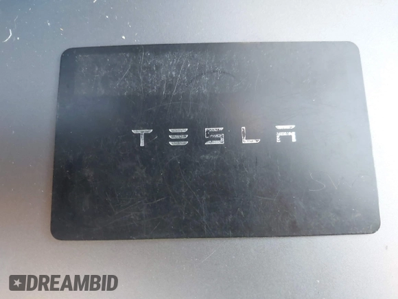 2023 Tesla Model Y Long Range with VIN 7SAYGAEEXPF714760, listed as a IAAI auction lot 41748398 with 49,802 mi miles and . Bid and sale history available at DreamBid. Image 11.