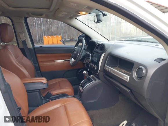 2016 Jeep Compass Latitude with VIN 1C4NJDEBXGD737018, listed as a IAAI auction lot 41800071 with 158,006 mi miles. Bid and sale history available at carsss.com. Image 5.