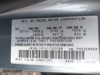 2012 Mazda Mazda3 i Touring with VIN JM1BL1VF4C1502088, listed as a IAAI auction lot 41474683 with 138,156 mi miles. Bid and sale history available at carsss.com. Image 9.