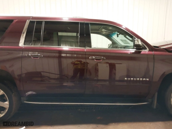 2017 Chevrolet Suburban Premier with VIN 1GNSKJKC4HR302244, listed as a IAAI auction lot 40850765 with 180,694 mi miles. Bid and sale history available at carsss.com. Image 13.