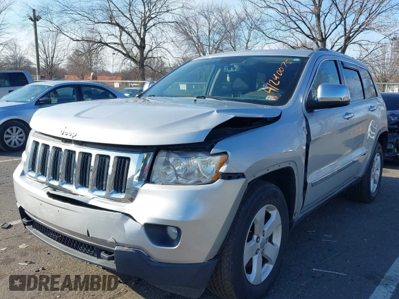 2011 Jeep Grand Cherokee Laredo z VIN 1J4RR4GG2BC511289, wystawiony jako IAAI lot #41240075 z przebiegiem 88 140 mil mil oraz . Historia ofert i sprzedaży dostępna na DreamBid. Obrazek 17.