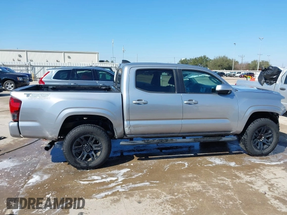 2021 Toyota Tacoma SR with VIN 3TYAX5GN0MT020061, listed as a IAAI auction lot 41592670 with 18,862 mi miles and . Bid and sale history available at DreamBid. Image 14.