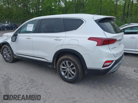 2019 Hyundai Santa Fe SE with VIN 5NMS2CAD9KH117777, listed as a IAAI auction lot 42296811 with 82,188 mi miles and . Bid and sale history available at DreamBid. Image 3.