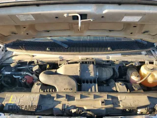 2009 Ford Econoline Passenger XL z VIN 1FBSS31L99DA09240, wystawiony jako Copart lot #80710344 z przebiegiem 108 437 mil mil oraz Szkoda całkowita • Salvage title. Historia ofert i sprzedaży dostępna na DreamBid. Obrazek 12.