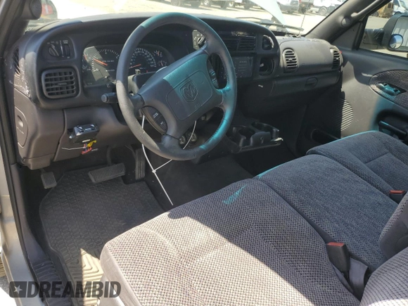 2001 Dodge 2500 with VIN 3B7KC23691G164405, listed as a Copart auction lot 55226025 with 144,428 mi miles and Salvage Title. Bid and sale history available at DreamBid. Image 8.