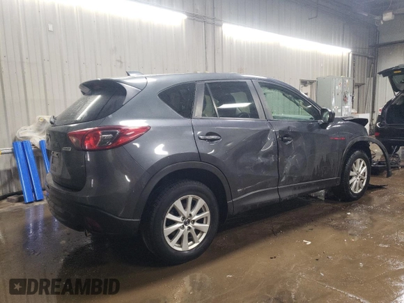 2014 Mazda CX-5 Sport z VIN JM3KE4BE2E0371864, wystawiony jako Copart lot #47225335 z przebiegiem 157 483 mil mil oraz Szkoda całkowita • Salvage title. Historia ofert i sprzedaży dostępna na DreamBid. Obrazek 3.