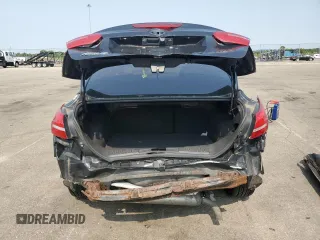 2018 Ford Focus SE z VIN 1FADP3F2XJL228407, wystawiony jako Copart lot #59254415 z przebiegiem 75 241 mil mil oraz Szkoda całkowita • Salvage title. Historia ofert i sprzedaży dostępna na DreamBid. Obrazek 6.
