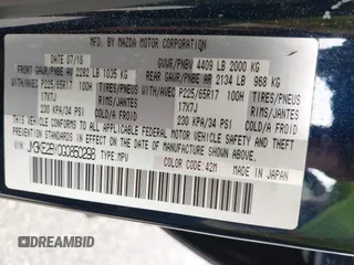 2016 Mazda CX-5 Sport with VIN JM3KE2BY0G0850298, listed as a IAAI auction lot 42107007 with 97,478 mi miles. Bid and sale history available at carsss.com. Image 9.