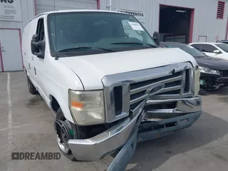 2009 Ford Econoline Cargo Commercial with VIN 1FTNE14W09DA38068, listed as a IAAI auction lot 41690071 with 182,337 mi miles and . Bid and sale history available at DreamBid. Image 1.