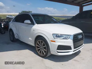 2018 Audi Q3 Premium z VIN WA1BCCFS5JR023131, wystawiony jako IAAI lot #42307506 z przebiegiem 52 995 mil mil oraz . Historia ofert i sprzedaży dostępna na DreamBid. Obrazek 1.