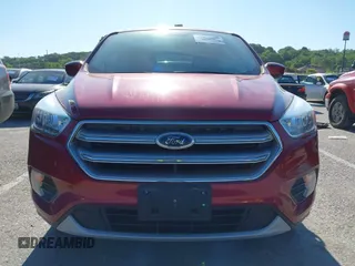 2017 Ford Escape SE z VIN 1FMCU9G9XHUE08239, wystawiony jako IAAI lot #42326698 z przebiegiem 96 471 mil mil oraz . Historia ofert i sprzedaży dostępna na DreamBid. Obrazek 12.