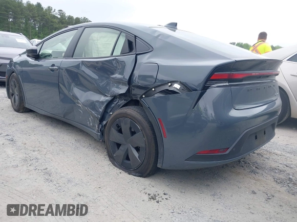 2024 Toyota Prius LE with VIN JTDACAAU9R3028815, listed as a IAAI auction lot 42150442 with 20,510 mi miles and . Bid and sale history available at DreamBid. Image 3.