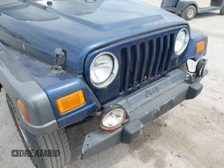 2004 Jeep Wrangler X with VIN 1J4FA39S64P726711, listed as a IAAI auction lot 42227336 with Not Provided miles and . Bid and sale history available at DreamBid. Image 6.