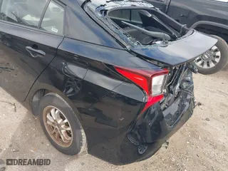 2022 Toyota Prius L Eco with VIN JTDKAMFUXN3164174, listed as a IAAI auction lot 41512388 with 33,664 mi miles. Bid and sale history available at carsss.com. Image 6.