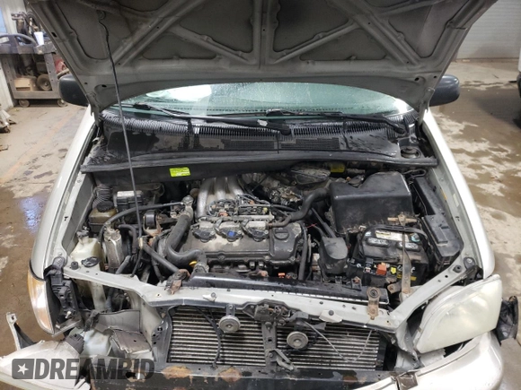 2002 Toyota Sienna LE with VIN 4T3ZF13C02U446097, listed as a Copart auction lot 77127844 with 182,873 mi miles and Salvage Title. Bid and sale history available at carsss.com. Image 12.