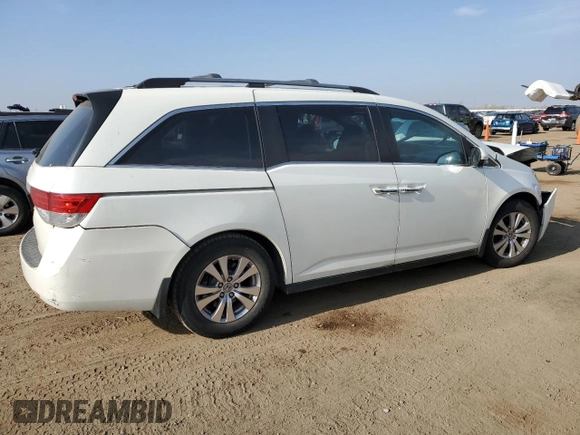 2016 Honda Odyssey with VIN 5FNRL5H62GB143676, listed as a Copart auction lot 54407205 with 113,423 mi miles and Salvage Title. Bid and sale history available at DreamBid. Image 3.